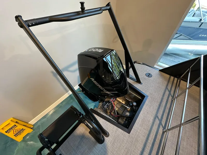 Slide: The Image of 2025 Viaggio Lago X-S boat engine display in showroom setting. - 11