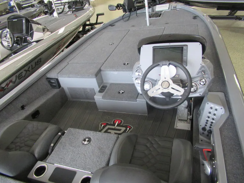 Slide: The Image of 2025 Vexus AVX 2080 boat interior with modern dashboard and seating. - 5