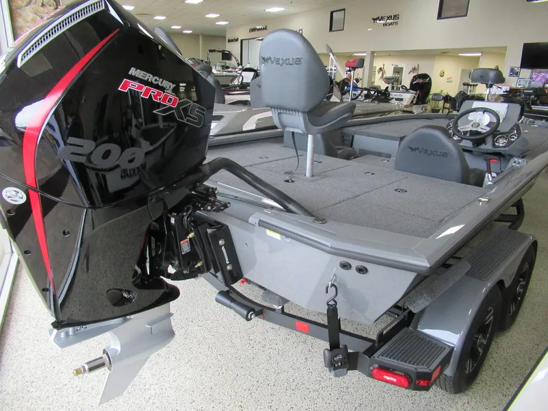 Slide: The Image of 2025 Vexus AVX 2080 boat with Mercury Pro XS engine in showroom. - 6