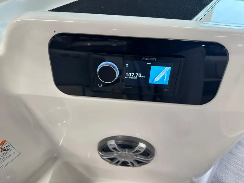 Slide: The Image of 2025 Sea Ray SDX 250 boat audio system with digital display and speaker. - 14