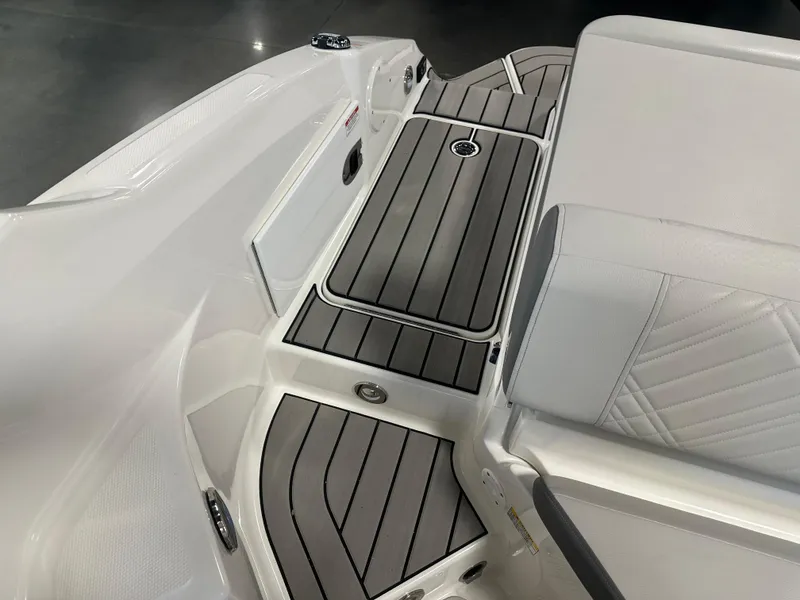 Slide: The Image of 2025 Sea Ray SDX 250 boat interior with sleek, modern deck design. - 23