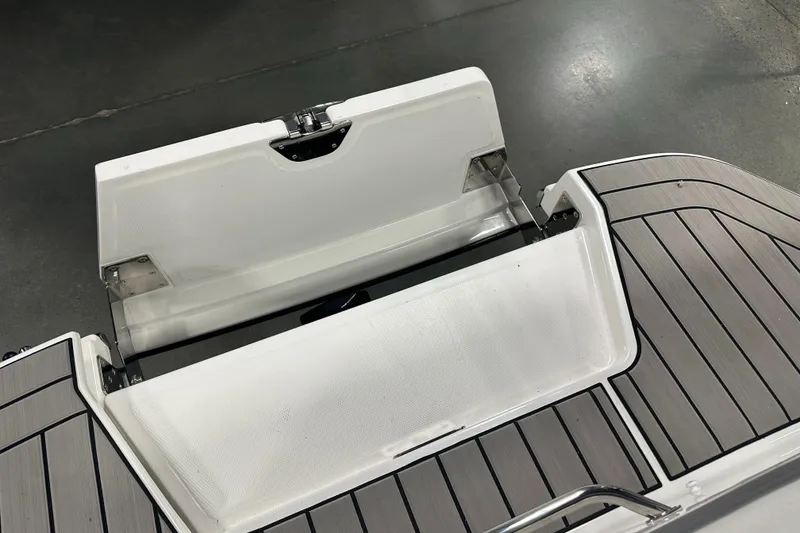 Slide: The Image of 2025 Sea Ray SDX 250 boat storage compartment with sleek design and durable materials. - 24