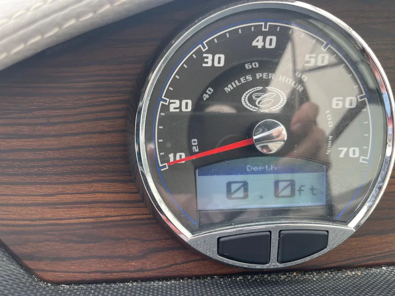 Slide: The Image of Speedometer of 2013 Cobalt 24SD boat, showing 0 mph and depth of 0.0 ft. - 17