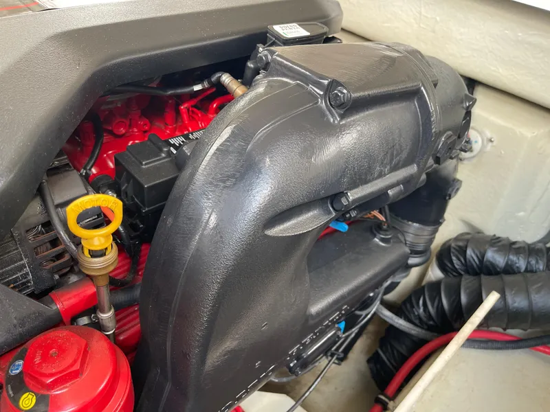 Slide: The Image of 2013 Cobalt 24SD engine compartment with visible components and wiring. - 40