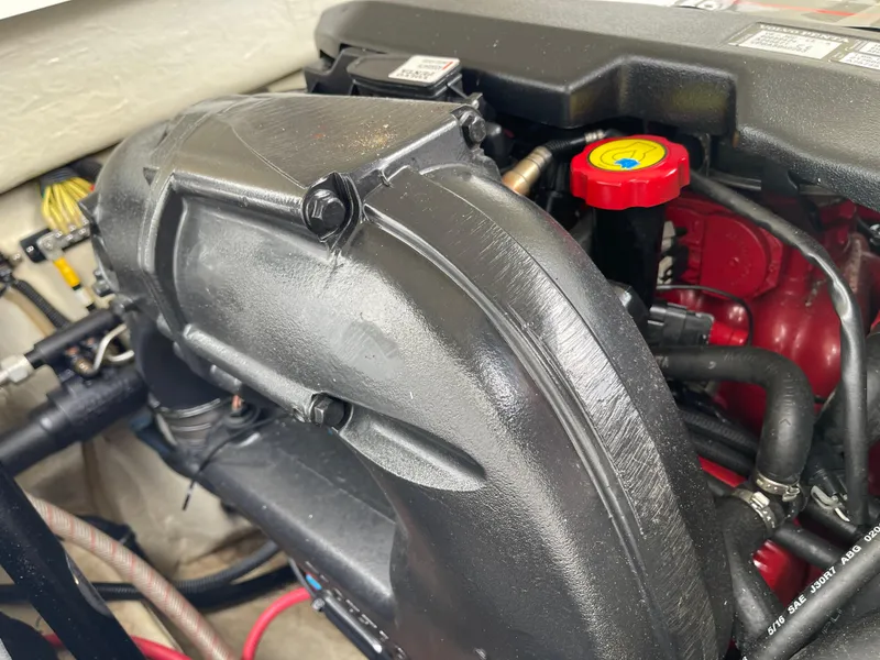 Slide: The Image of 2013 Cobalt 24SD engine close-up with visible components and red cap. - 41