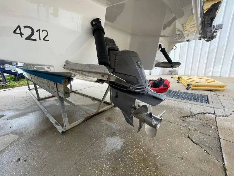 Slide: The Image of 2013 Cobalt 24SD boat stern drive and propeller detail. - 43