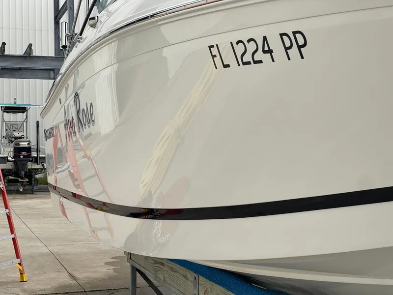 Slide: The Image of 2013 Cobalt 24SD boat with registration FL1224 PP in a storage facility. - 9