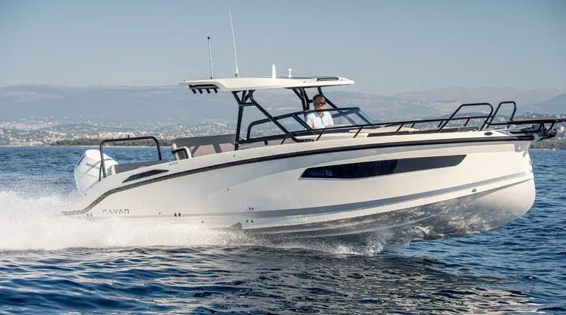 The Image of Navan S30 2025 boat cruising on open water, sleek design, sunny day. - 1