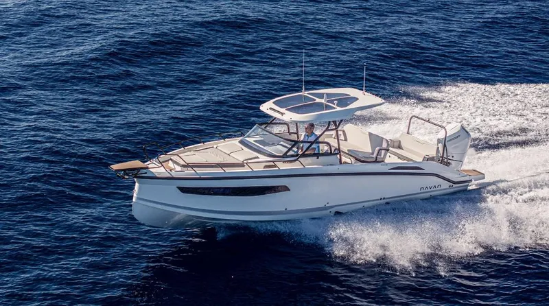 Slide: The Image of Navan S30 2025 model cruising on open sea, showcasing sleek design and performance. - 13