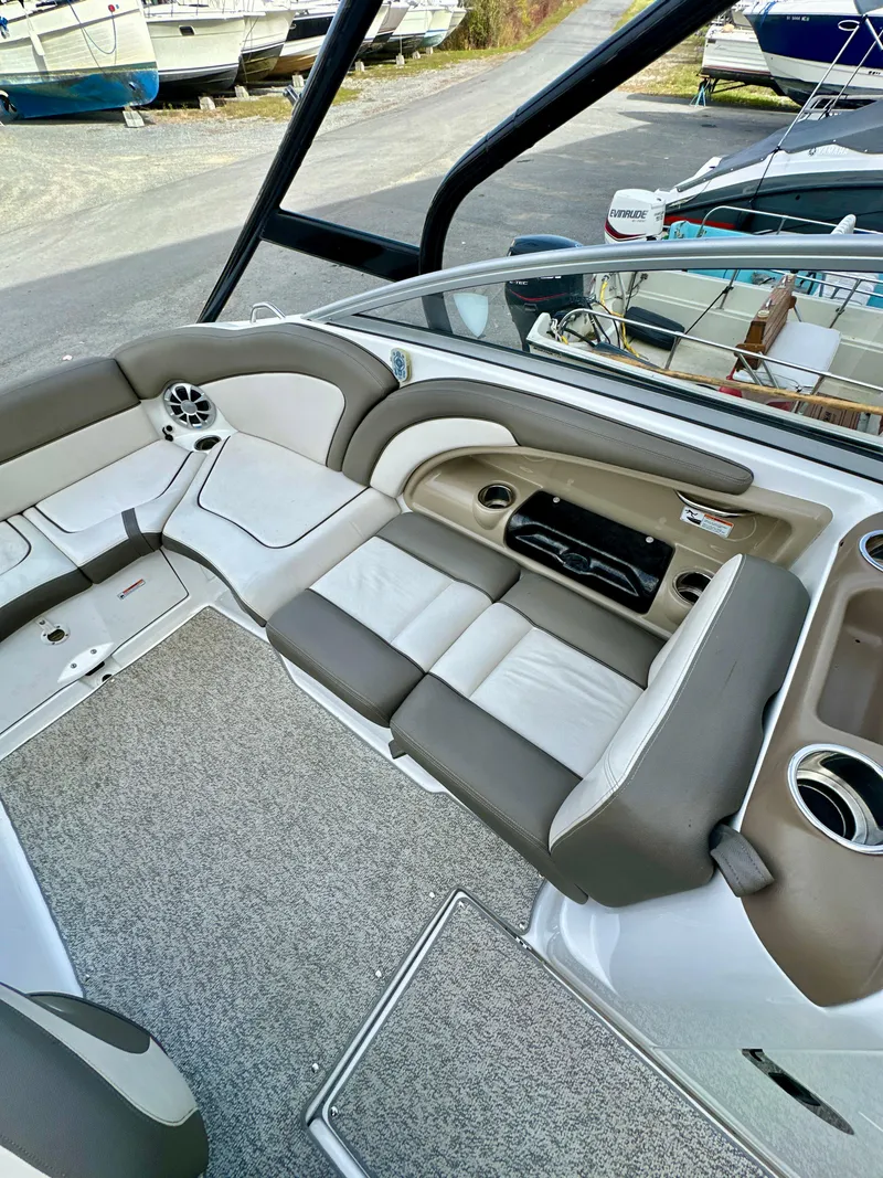 Slide: The Image of Interior of a 2012 Yamaha Boats 242 Limited S, featuring spacious seating and modern design. - 8