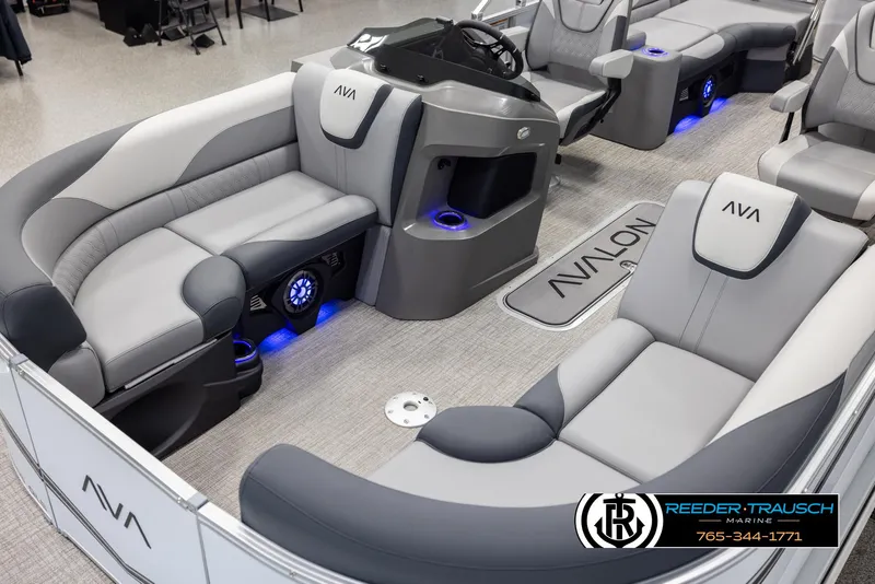 Slide: The Image of 2025 Avalon LSZ QLS boat interior with modern seating and ambient lighting. - 10