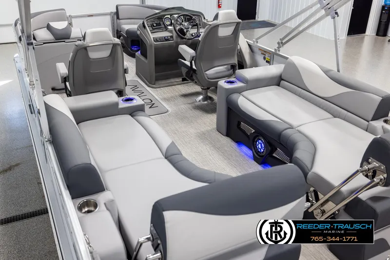 Slide: The Image of 2025 Avalon LSZ QLS pontoon boat interior with modern seating and dashboard. - 11