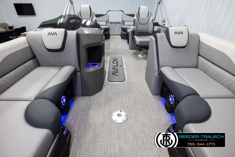 Slide: The Image of 2025 Avalon LSZ QLS boat interior with modern seating and blue LED lighting. - 13