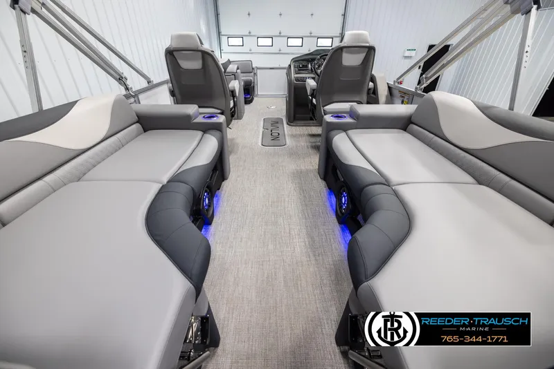 Slide: The Image of 2025 Avalon LSZ QLS boat interior with luxurious seating and ambient lighting. - 16