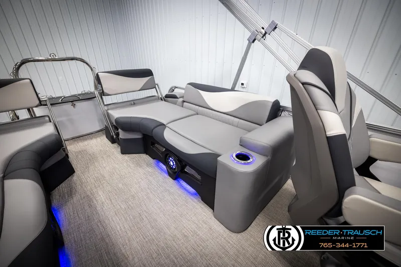 Slide: The Image of Luxurious 2025 Avalon LSZ QLS boat interior with plush seating and ambient lighting. - 23