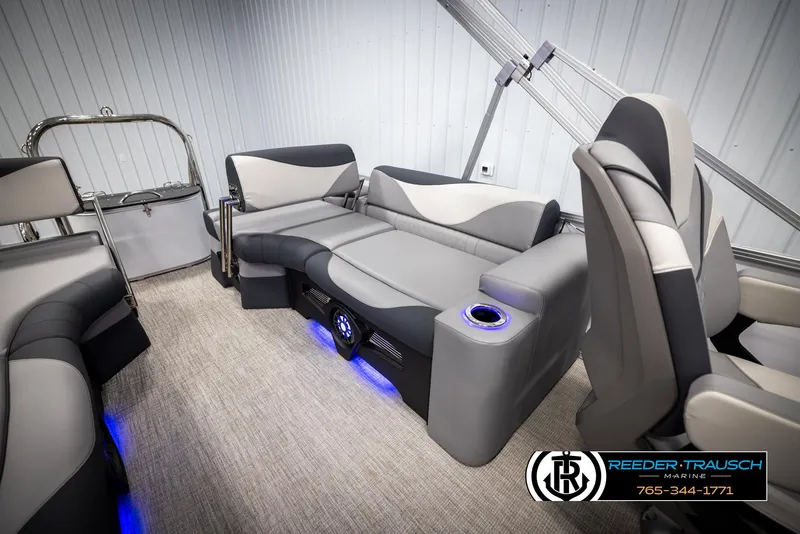 Slide: The Image of 2025 Avalon LSZ QLS boat interior with modern seating and blue LED lighting. - 24