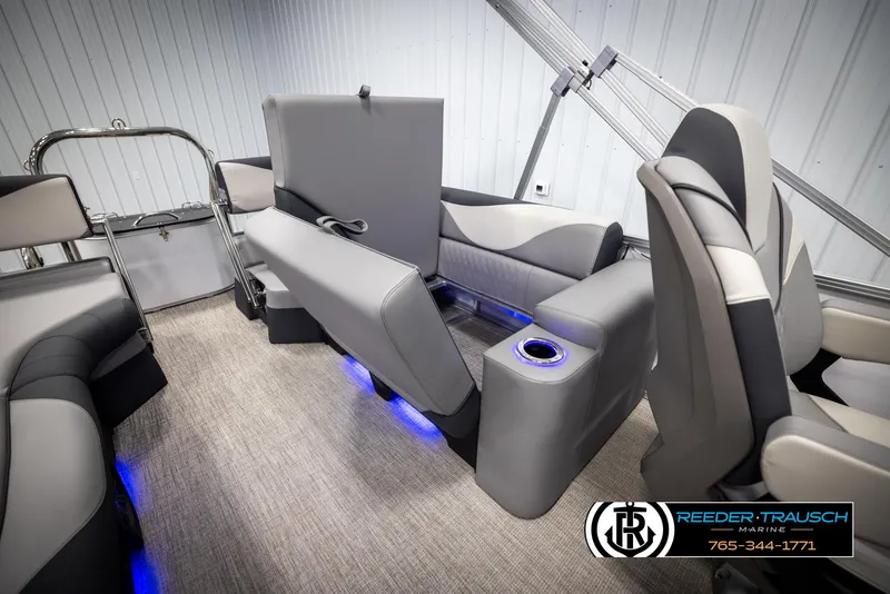 Slide: The Image of 2025 Avalon LSZ QLS boat interior with gray seating and blue LED lighting. - 25