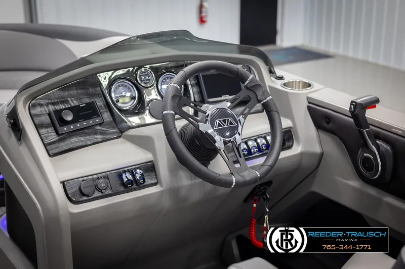 Slide: The Image of 2025 Avalon LSZ QLS boat dashboard with modern steering wheel and controls. - 27