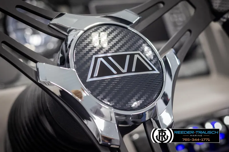 Slide: The Image of Close-up of 2025 Avalon LSZ QLS steering wheel with carbon fiber design. - 28