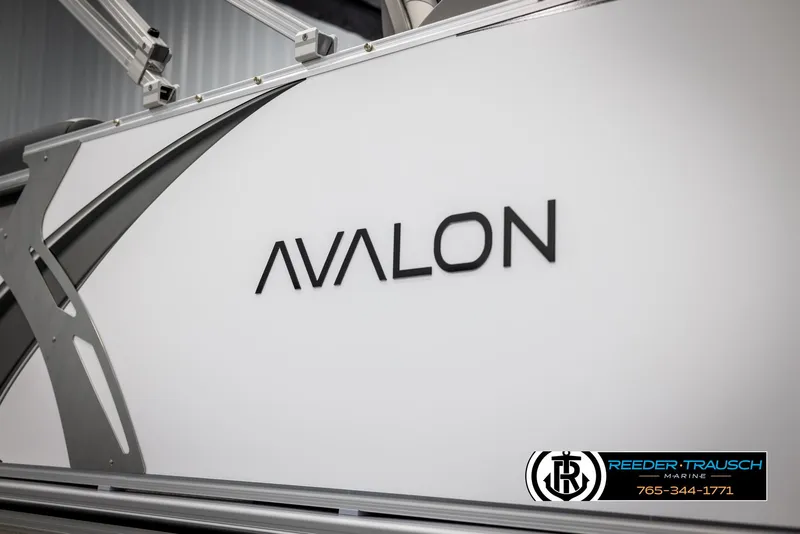 Slide: The Image of 2025 Avalon LSZ QLS boat side view with logo and design details. - 45