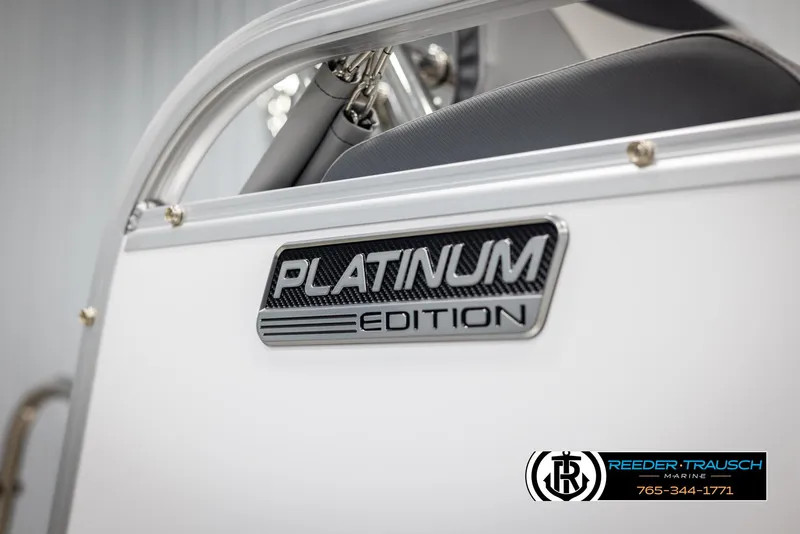 Slide: The Image of 2025 Avalon LSZ QLS Platinum Edition boat detail with logo and contact information. - 46