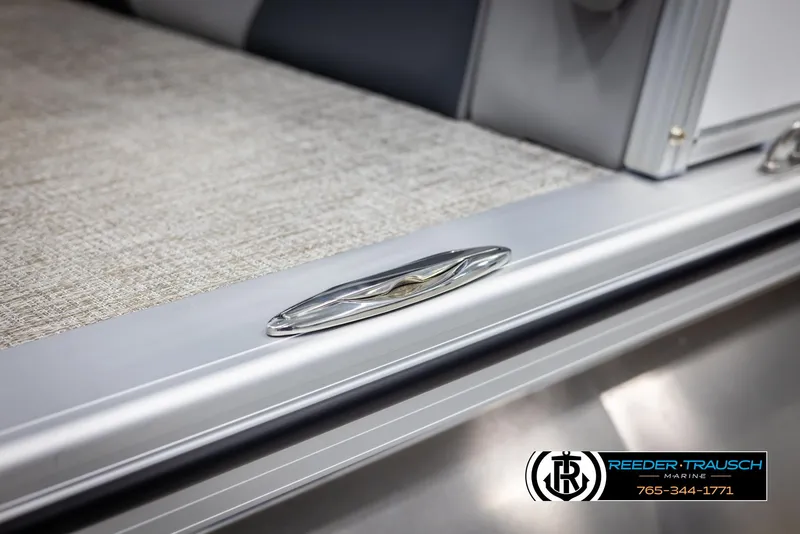 Slide: The Image of Avalon LSZ QLS 2025 boat detail with sleek metallic finish and carpeted interior. - 49