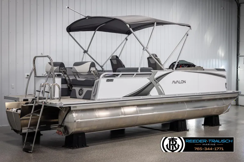 Slide: The Image of 2025 Avalon LSZ QLS pontoon boat with canopy in showroom. - 6