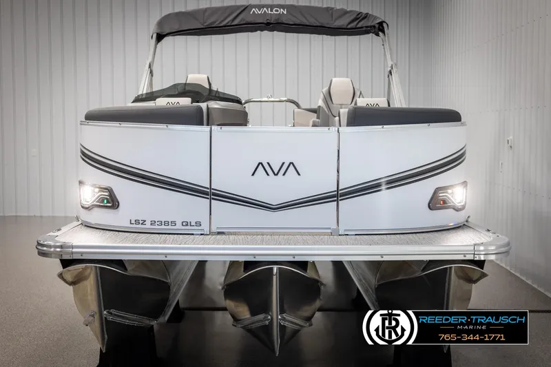 Slide: The Image of 2025 Avalon LSZ QLS pontoon boat, front view in showroom. - 8