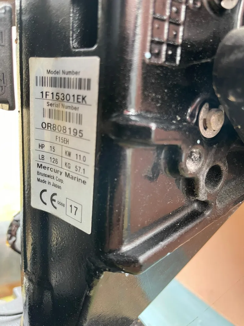 Slide: The Image of Close-up of a 2017 Rossiter Estate Skiff engine label with specifications. - 11