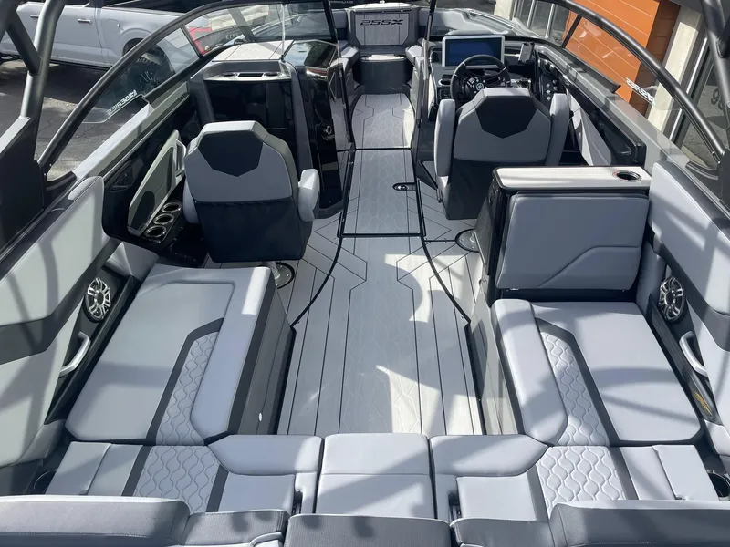 Slide: The Image of 2025 Yamaha Boats 255XE interior with modern seating and sleek design. - 5