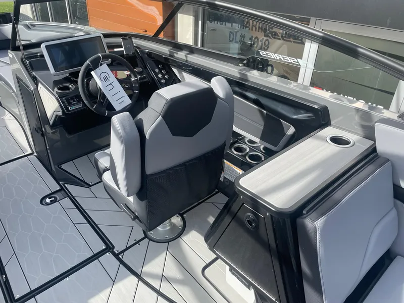 Slide: The Image of 2025 Yamaha Boats 255XE cockpit with modern controls and sleek design. - 6