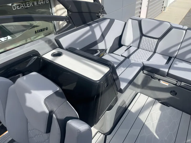Slide: The Image of Luxurious seating area on 2025 Yamaha Boats 255XE with modern design and premium materials. - 7