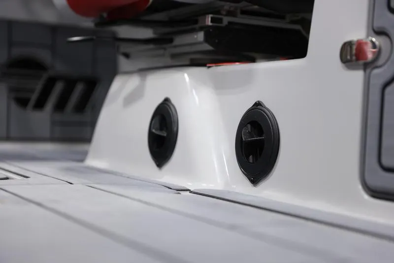 Slide: The Image of 2024 Malibu 24 MXZ boat interior detail with sleek design and modern features. - 12