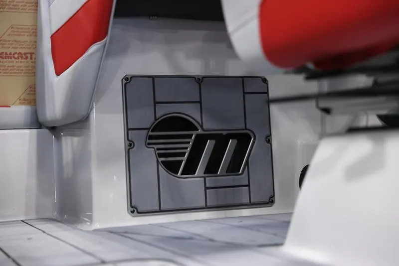 Slide: The Image of 2024 Malibu 24 MXZ interior detail with logo and red accents. - 14