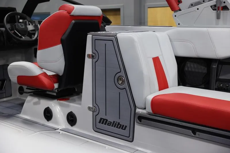 Slide: The Image of 2024 Malibu 24 MXZ interior with red and white seating, modern design. - 20