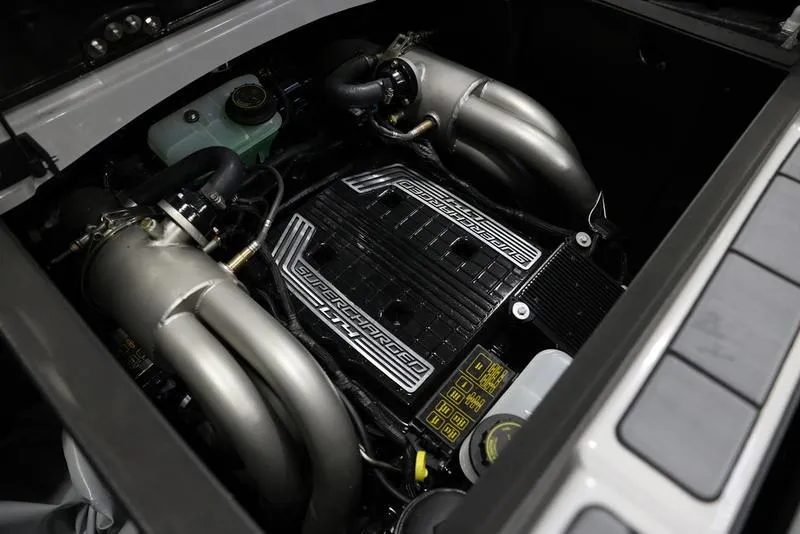 Slide: The Image of 2024 Malibu 24 MXZ engine compartment showcasing powerful components and sleek design. - 3