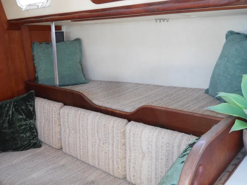 Slide: The Image of Interior of 1985 Sabre 38 MK I sailboat with cozy seating and cushions. - 15