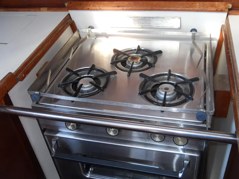 Slide: The Image of Stainless steel stove with three burners in a 1985 Sabre 38 MK I yacht kitchen. - 9