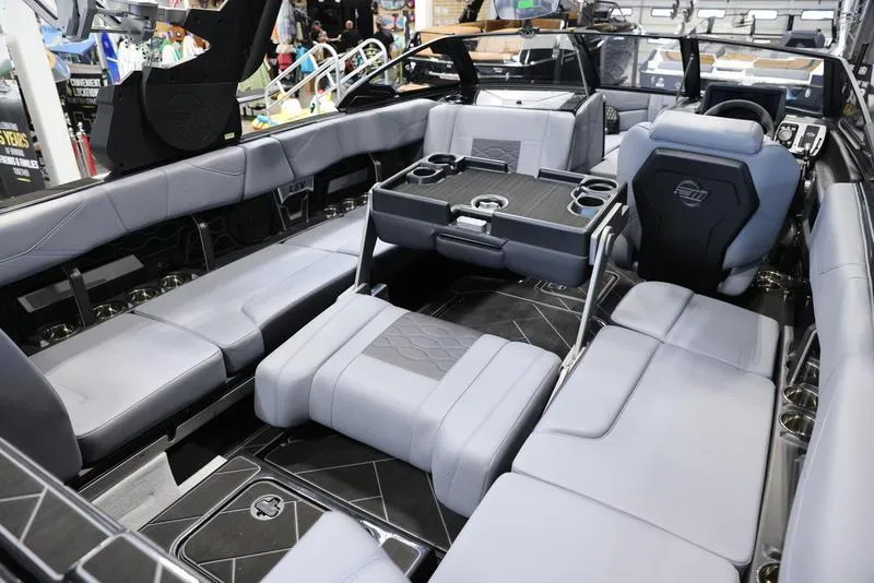 Slide: The Image of 2024 Malibu 23 LSV boat interior with luxurious seating and modern design. - 19
