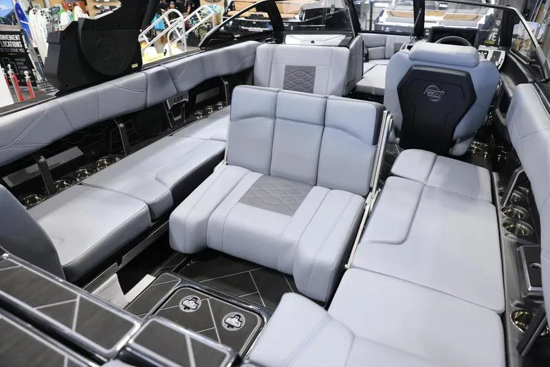 Slide: The Image of 2024 Malibu 23 LSV interior with luxurious gray seating and modern design. - 20
