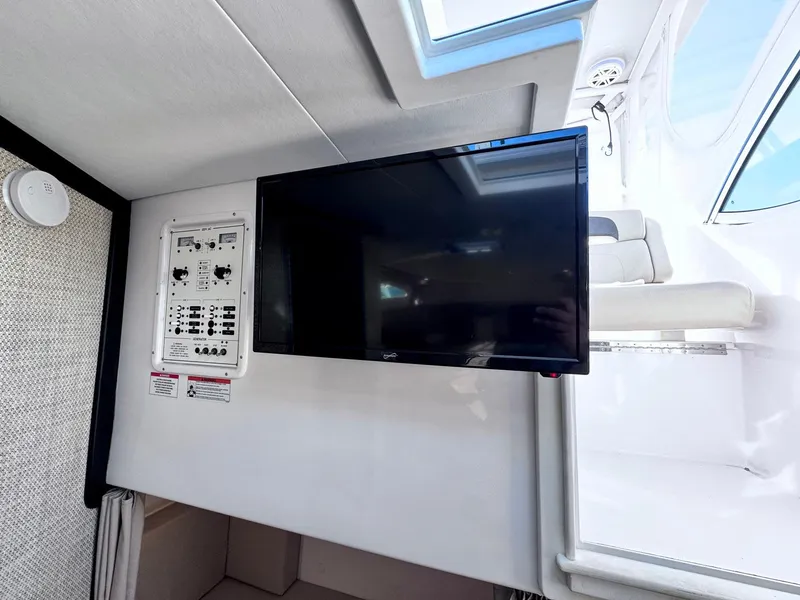 Slide: The Image of 2022 Stamas 370 Aegean interior with mounted TV and control panel. - 21