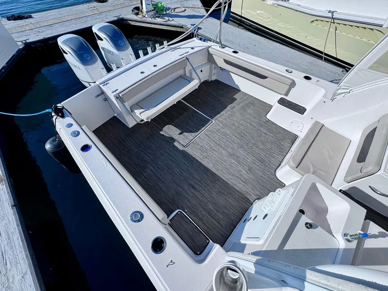 Slide: The Image of 2022 Stamas 370 Aegean boat deck with seating and twin outboard motors. - 42