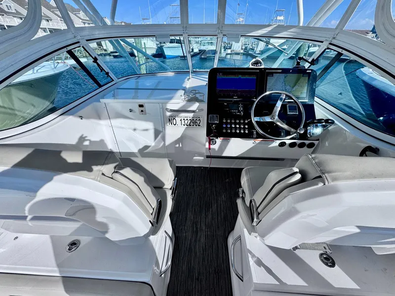 Slide: The Image of Interior view of 2022 Stamas 370 Aegean boat cockpit with steering wheel and navigation equipment. - 43
