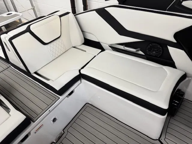 Slide: The Image of 2025 Yamaha Boats 252SD interior seating with modern design and sleek upholstery. - 14