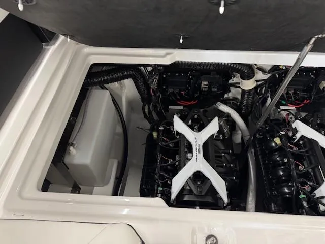 Slide: The Image of 2025 Yamaha Boats 252SD engine compartment showcasing dual engines and wiring. - 17