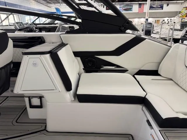 Slide: The Image of 2025 Yamaha Boats 252SD interior seating with modern design and black accents. - 19