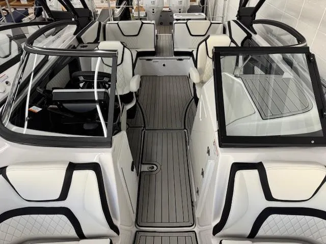 Slide: The Image of 2025 Yamaha Boats 252SD interior with sleek seating and modern design. - 2