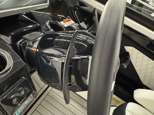 Slide: The Image of 2025 Yamaha Boats 252SD steering wheel and dashboard interior view. - 8