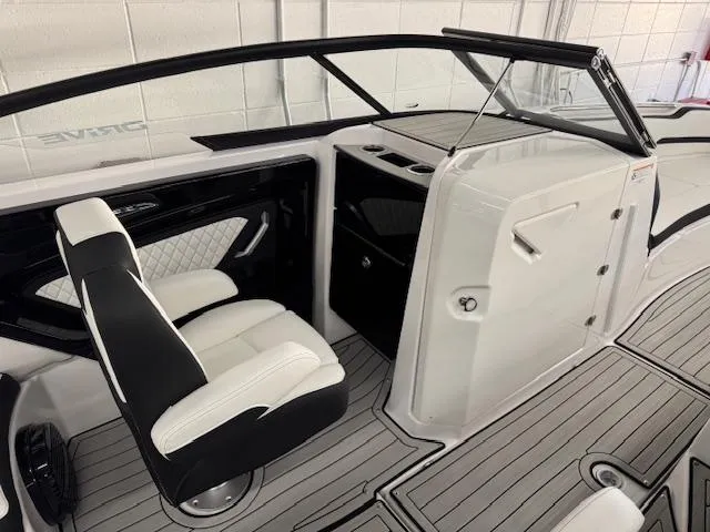 Slide: The Image of 2025 Yamaha Boats 252SD interior with sleek seating and modern design. - 9