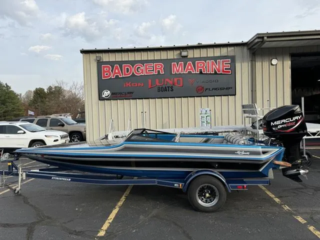 Slide: The Image of 1989 Hydrostream Vegas XT boat with Mercury outboard at Badger Marine dealership. - 1